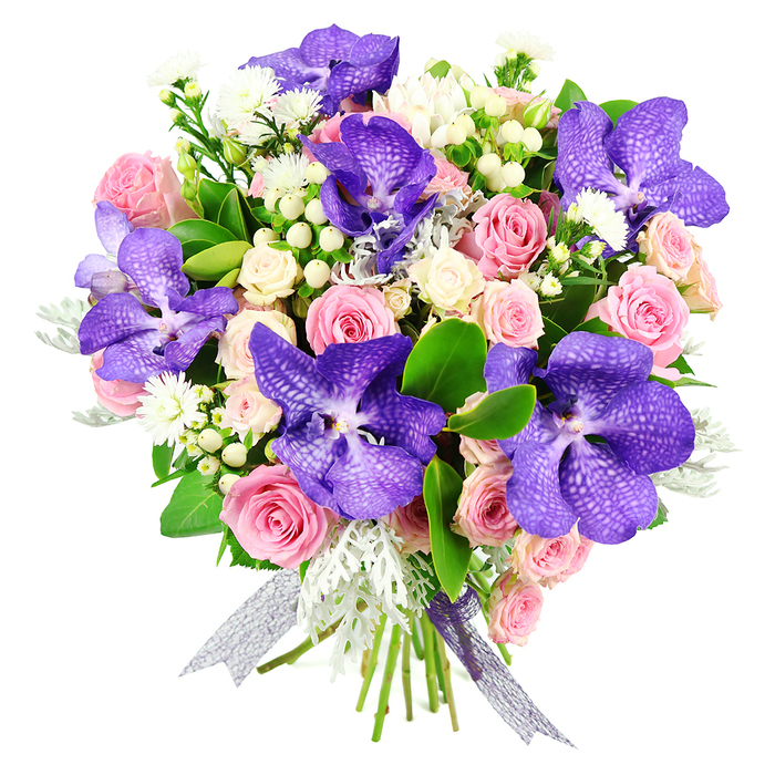 This sophisticated floral bouquet is captured against a bright white background, giving it the presence of a carefully framed artwork and allowing every bloom to be appreciated in detail. The focal flowers are several large Vanda orchids, their petals a rich blend of deep purple and indigo, marked with distinctive speckles and fine veining that hint at their exotic origin. They rise slightly above the other flowers, lending height and a touch of drama that would look at home in a contemporary South Croydon apartment or as a statement gift delivered near Croham Hurst. Surrounding the orchids, a generous selection of pastel pink roses are arranged in varying stages of bloom, from tight, promising buds to fully open, cupped flowers with gently curling edges. Nestled amongst them are clusters of creamy white spray roses, each cluster contributing softness and volume, so the bouquet feels reassuringly full and lush. Threads of small, star-shaped white blossoms and glossy white or cream hypericum berries are woven between the roses, adding light, texture, and a modern twist. The foliage creates a rich tapestry behind the flowers: deep green, glossy leaves provide a strong, structural base, while silvery-grey dusty miller softens the overall look with its velvety, almost frosted appearance. The stems are expertly gathered and secured with a shimmering, semi-sheer ribbon in silver and lilac tones, its gentle sheen echoing the orchids' luxurious colour. This bouquet feels ideal for marking cherished occasions such as anniversaries, Valentine's Day, or special family celebrations in South Croydon, conveying a blend of classic romance and contemporary style that speaks of a florist's practiced hand and eye for harmonious design.