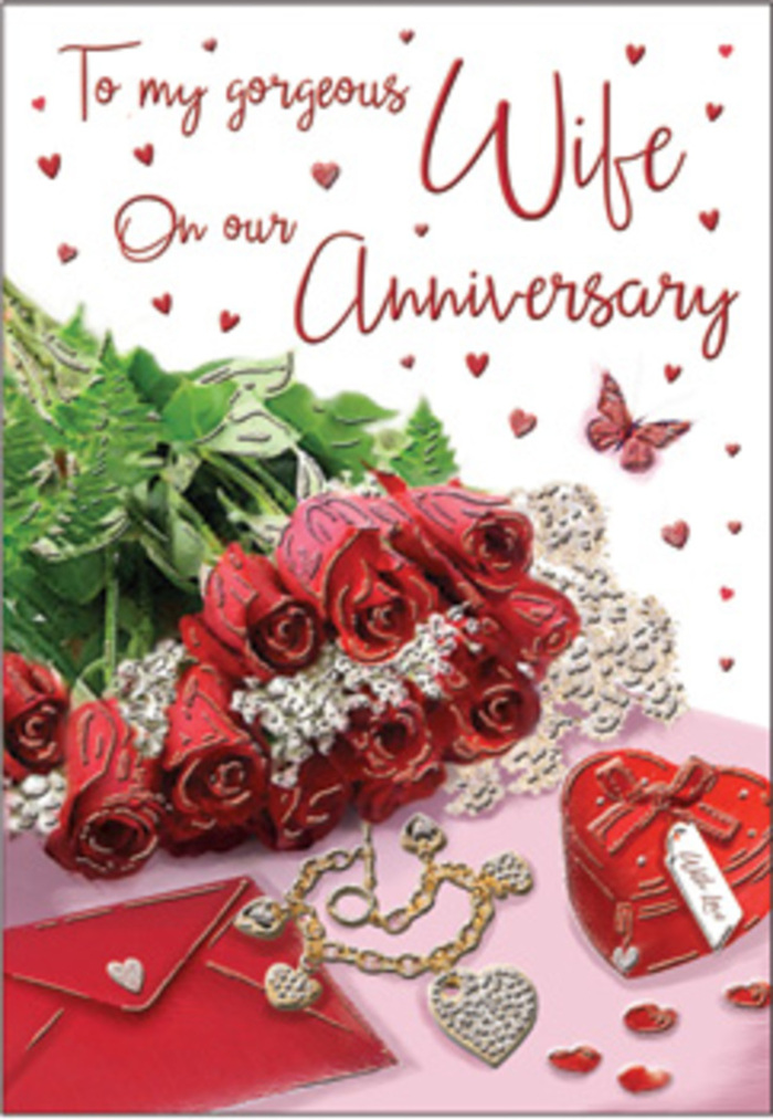 In this richly composed anniversary image, a bouquet of classic red roses takes centre stage, their full, velvety blooms arranged with the sort of care you might expect from a seasoned South Croydon florist. Each rose is a deep, saturated crimson, the outer petals gently curving away while the inner whorls spiral inward, creating a sense of depth and softness you can almost feel beneath your fingertips. The roses are embraced by lush greenery, which curls and fans out around them, the leaves glossy and fresh, adding a sense of natural abundance that calls to mind the green spaces around the South Croydon area. Nestled alongside the bouquet, a delicately folded envelope rests on a softly shimmering surface, suggesting a personal, handwritten message tucked carefully inside. A small jewellery piece lies close by, perhaps a necklace or bracelet, its fine chain catching and reflecting the light with subtle flashes of gold or silver. Near it sits a vivid red heart-shaped box, its smooth, luxurious exterior recalling velvet or satin, evoking memories of cherished gifts exchanged over years of companionship. Scattered heart motifs and tiny decorations add visual rhythm, leading the eye gently across the composition and drawing attention to the finer details. A single butterfly figure appears as if in mid-hover, symbolising transformation and the ongoing growth of love. The lighting is gentle yet clear, washing over every element and creating soft highlights on petals, metal, and paper. Together, these details form a romantic, tactile still life that celebrates anniversaries with quiet elegance and heartfelt emotion, much like a carefully chosen gift delivered across South Croydon.